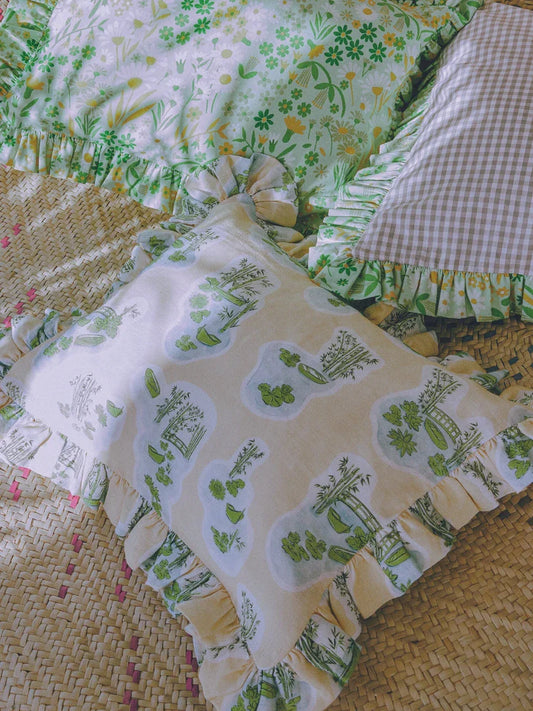 Decorative pillows with floral and tropical patterns showcasing tropical summer home decor style