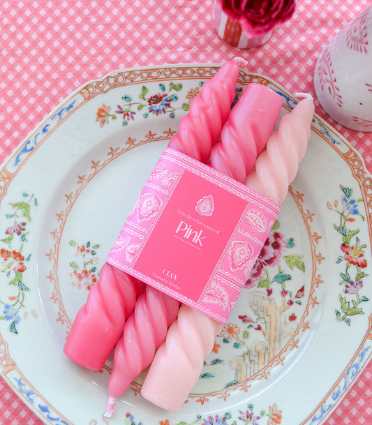 Pink Paisley candle collection review featuring three twisted pink candles on a floral decorative plate